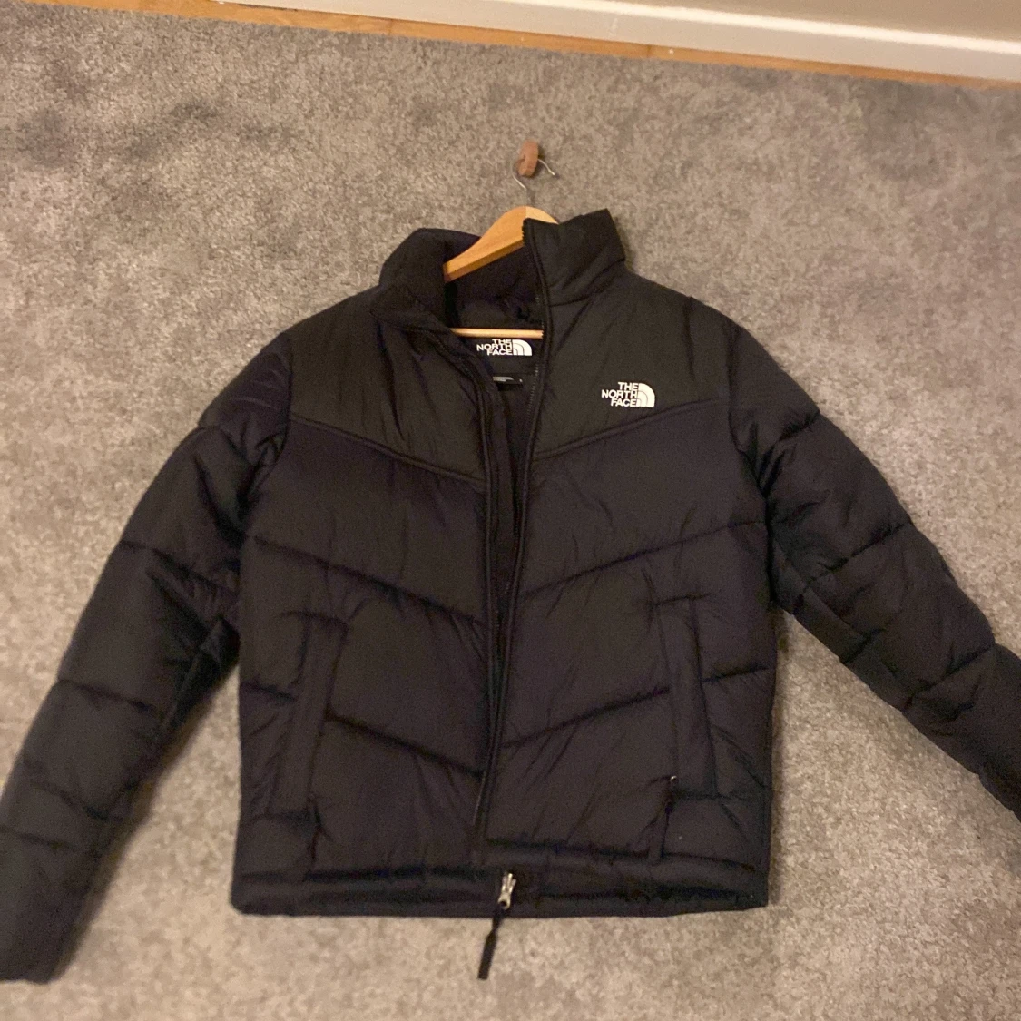 Svart dunjacka från The North Face