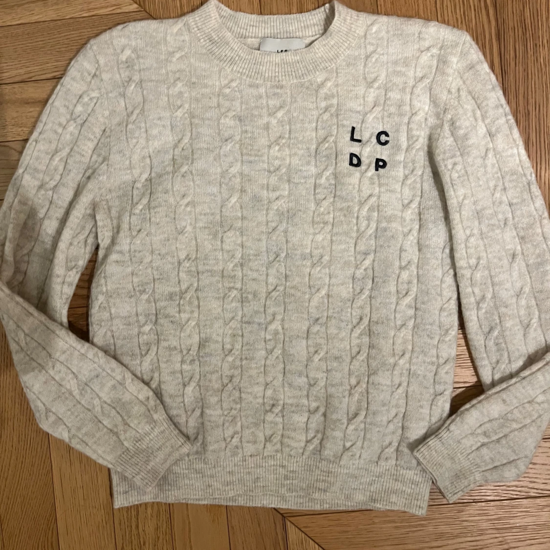 Beige stickad tröja från Les Coyotes de Paris