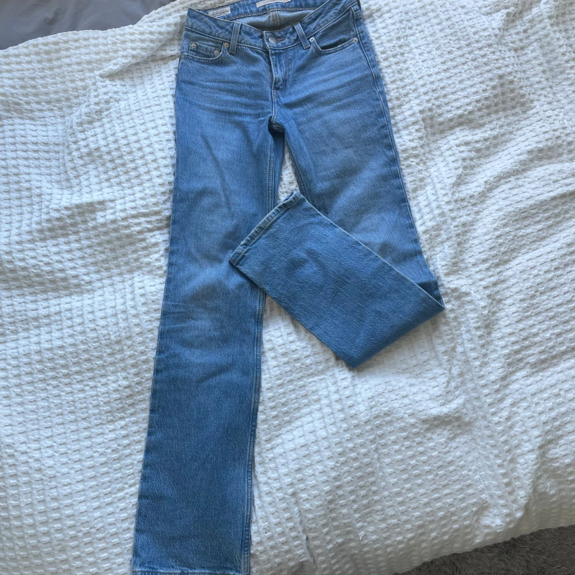 Ljusblåa Levi’s jeans - 90