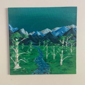 Å landskap - I gott skick då den bara har hanteras av konstnären. En tavla av ett landskap med ett antal björkträd.  Signerad av konstnären 