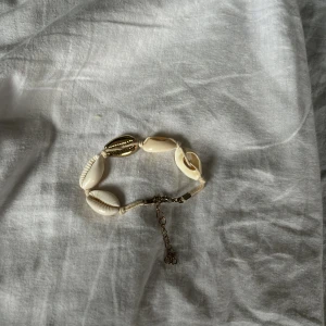 Snäckarmband - Bra skick fin och somrig stainless guld 