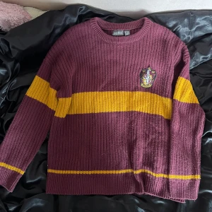 Gryffindor tröja - En gryffindortröja i storlek L