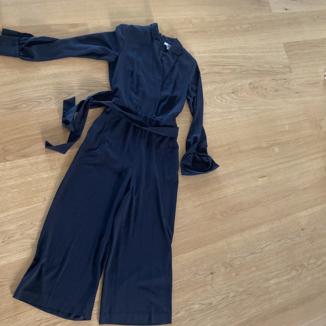 Svart långärmad jumpsuit