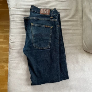 Nudie jeans grim tim - Ett par sköna slim jinz från nudie i modellen grim Tim. Topp kvalle inga defekter. Nypris 1600. Skriv gärna vid frågor 🙌