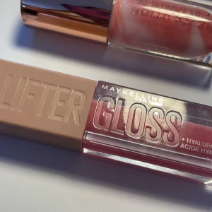 2 läppglans  - Liftergloss, revolution, 110st. Helt oandvända endast öppnat! Luktade starkt, inte gott. Priset kan diskuteras, Skriv!