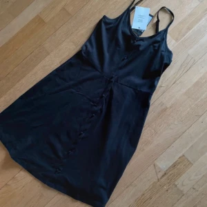 Strandklänning strl 36  - Bra skick  Strl 36  Strandklänning  Svart 