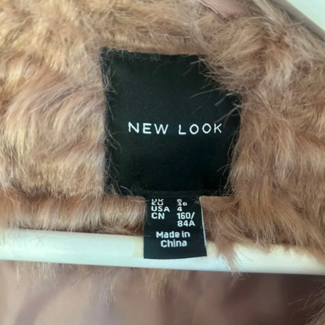 Gammelrosa fejk päls Väst - 91