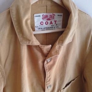 LVC Levis Vintage Clothing Sunset coat S - Sunset coat från Levis LVC i stl S (stor i storlek och passar M). Mässingknappar och en väldigt välgjord jacka. Sitter grymt bra och passar såklart perfekt med jeans.