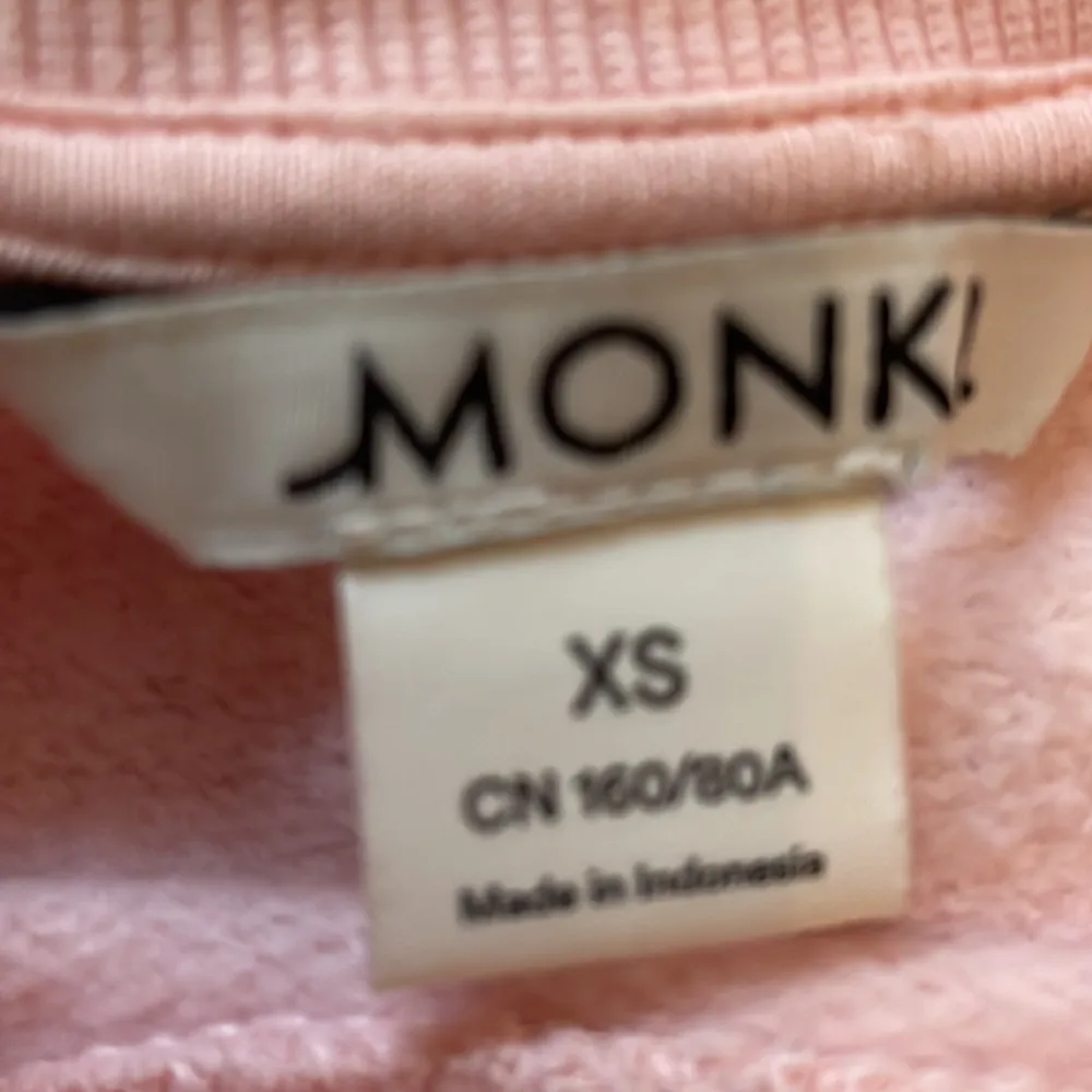 Rosa tröja Monki Seoul. Hoodies.