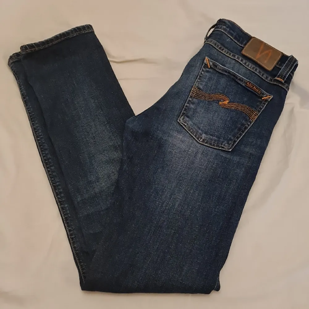 Nudie Jeans 'Tube Tom' Jeans, slim fit. Skick 9/10, endast ett flaw men påverkar ej användning 30/34. Jeans & Byxor.