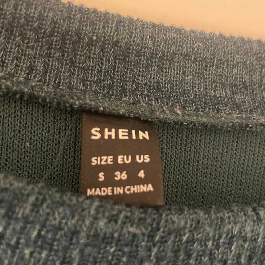 Mörkgrön stickad - 90