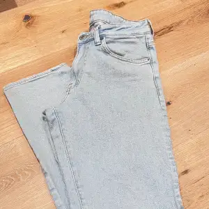 light washed straight legged jeans never worn before in perfect condition 