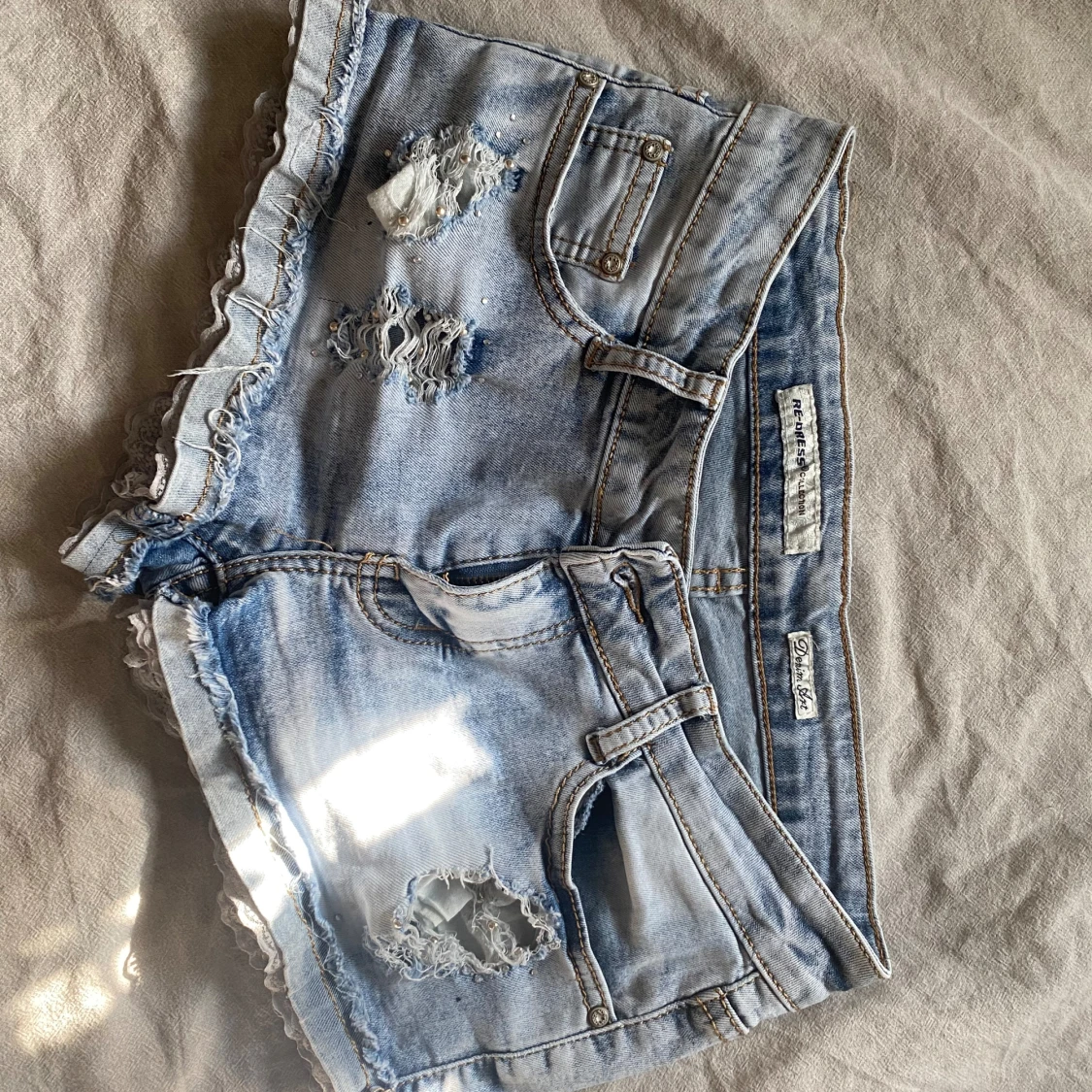 Lågmidjade jeansshorts  - 91