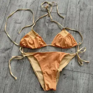 Gul eftertraktad bikini från H&M i storlek 36