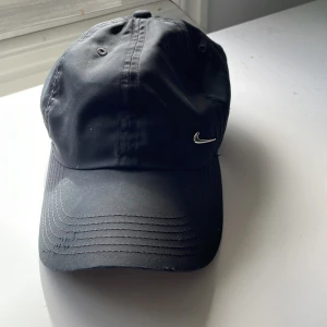 Nike  - Den keps är helt ny snygg på pris värd skriv om mer info 