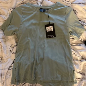 Tränings T-shirt - Helt ny träning-T-shirt köpt från intersport 