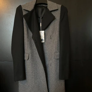 Ny ullkappa stl 32/S - Endast provad, alla lappar sitter kvar. Nypris 2999kr 