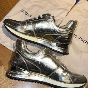 LV Runaway Trainers sneakers Gold colour in size EU 38.5. Women’s sneakers.  They are two years old , they have many scratches on both shoes and don’t look new. Still very nice and fresh! New price 1200 euro. Comes with two Louis Vuitton Dustbags. 