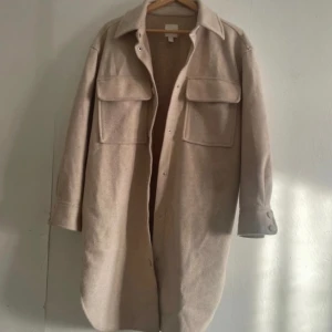 Kappa - En kappa som inte är trasig någon stans och nästan som ny