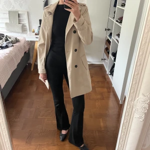 Trench coat - Aldrig använd! 