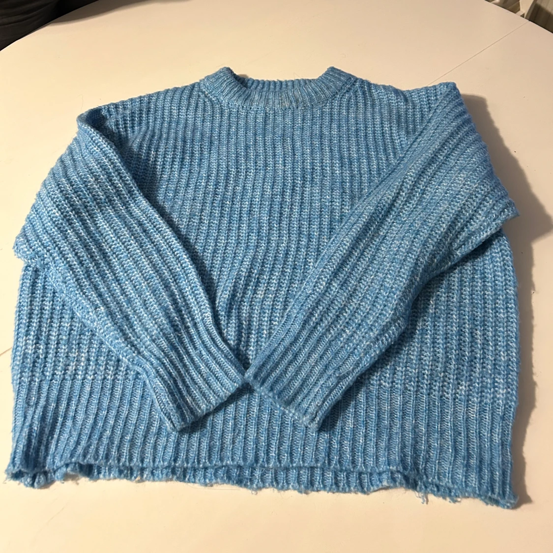 Blå stickad tröja