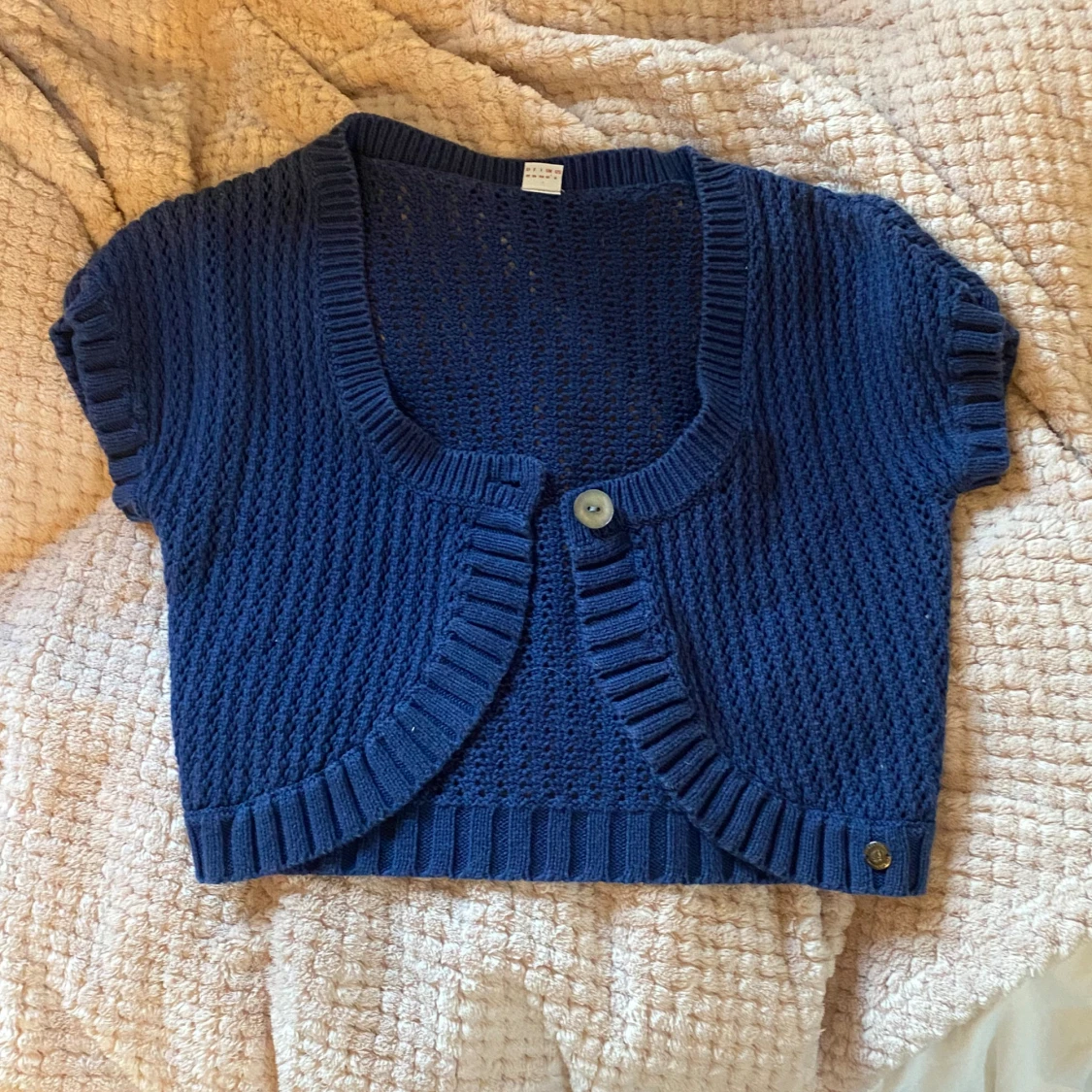 Kortärmad stickad cardigan - 90