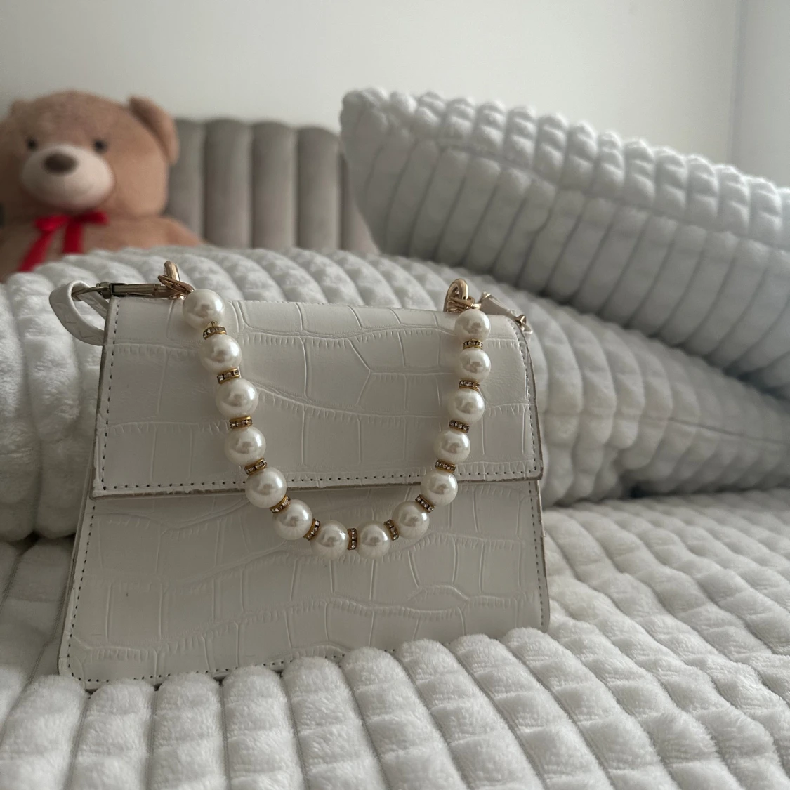 Pärl axelremsväska 