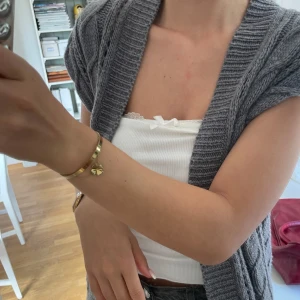 Stickad väst  - Köpt second hand strl M