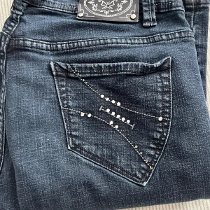 Y2k jeans  - Y2k jeans knappt använda, lite oklar storlek men skulle säga S.