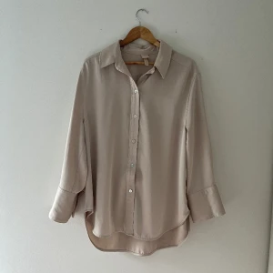 H&M satin shirt  - H&M- medium  Satin oversized button down shirt, Worn only a few times. 