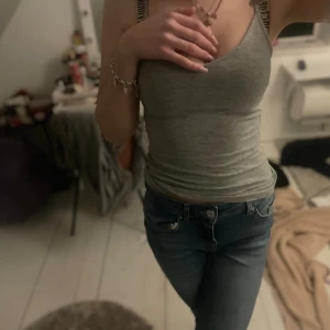 Grått uringat linne - Jätte fin uringad linne bara inte kommigt till användning 