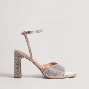 Glittriga klackskor med ankelband - Klackarna är från NA-KD och är aldrig använda. Ser ut som på bilden och är jättesnygga🩷 Storlek: 40 (klackhöjd: 8,5cm) Ursprungligt pris: 699kr