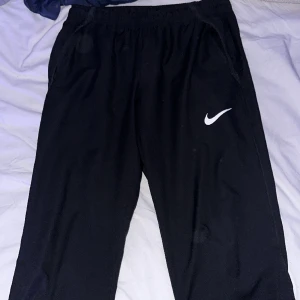 NIKE tuggare byxor - Byxor till centrumtuggare