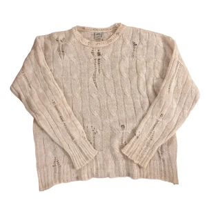 Stickad tröja - Vit stickad tröja med hål från Urban Outfitters, använd 1 gång