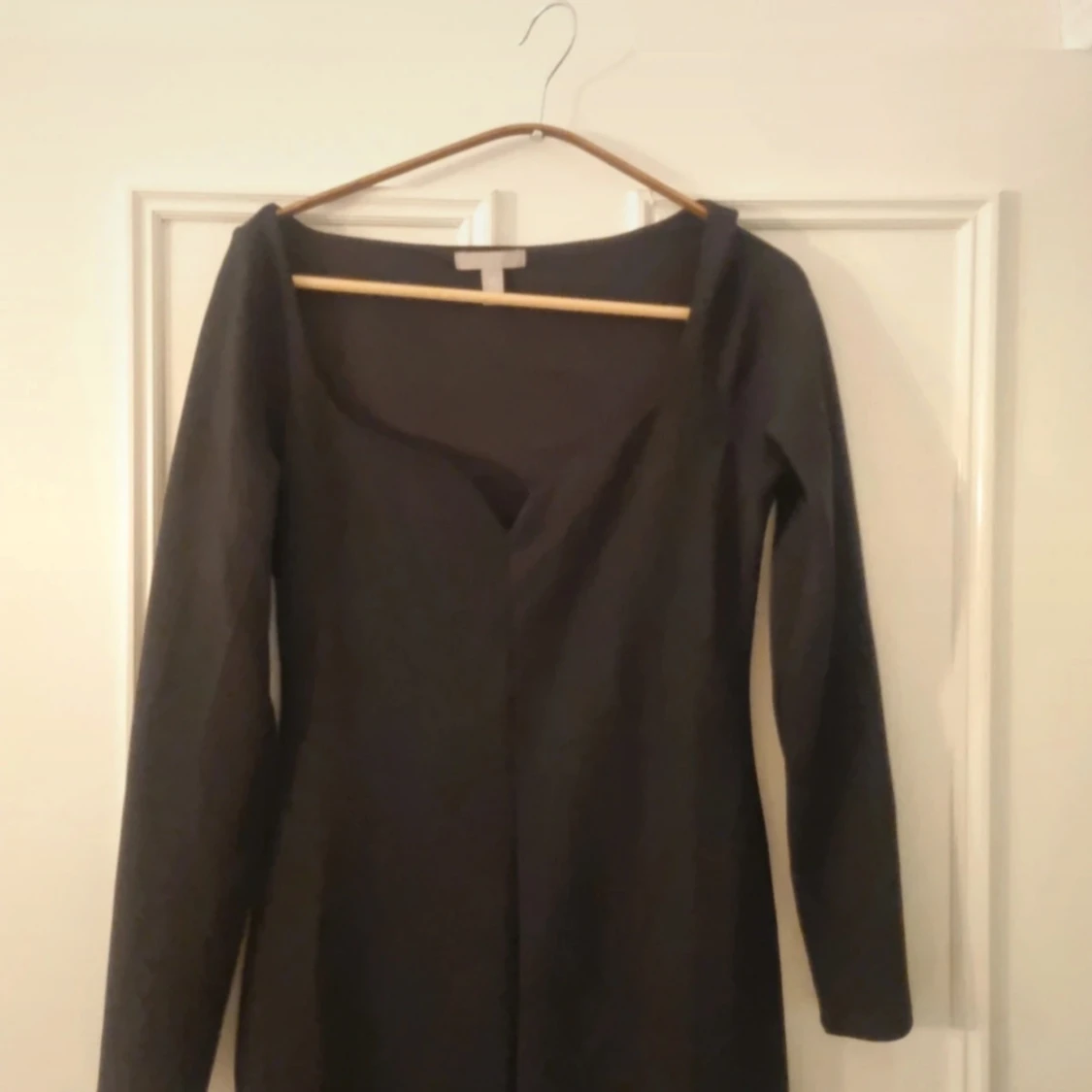 Svart långärmad klänning - 90