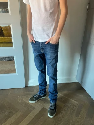 Nudie jeans  - Grim Tim.  Storlek 29/32