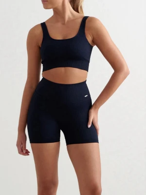 Träningsset aimn - Superfint ribbat träningsset från aim’n i marinblått. Endast använt ett fåtal gånger och är därför i jättebra skick. Båda delarna är i Xs. Nypris: 800:-