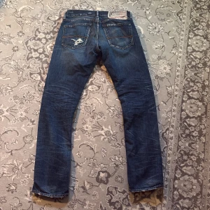 Ralph Lauren Denim & Supply jeans - Säljer dessa feta ralph lauren jeans! De är i mycket bra skick och det är inget fel på dom. De har skitsnygga detaljer och säljer dessa för ett värt pris nypris (200-3000). Det är en äldre sällsyntare modell. Skriv för förhandlingar eller andra frågor!