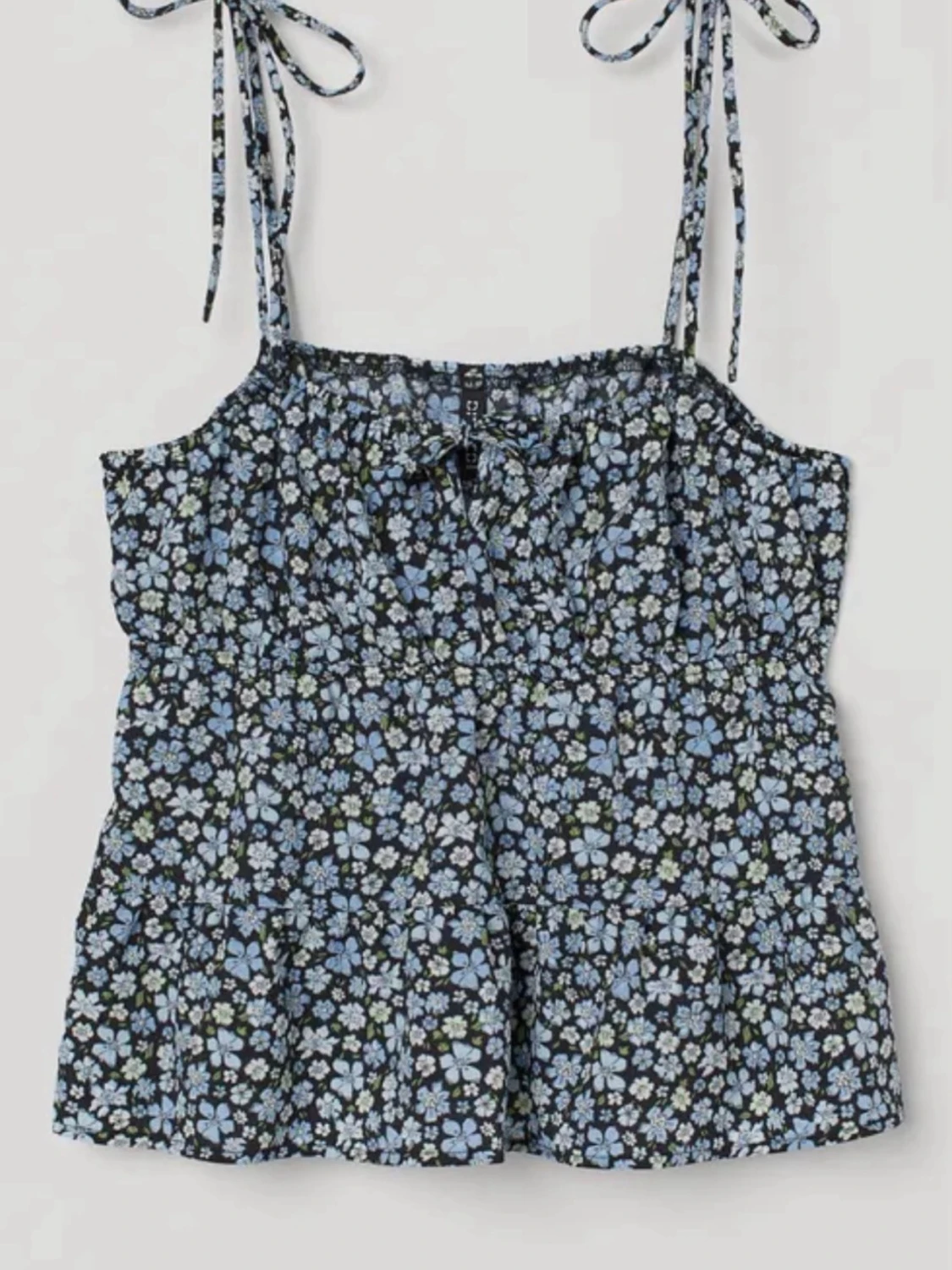 Blommig linnetopp med knytband