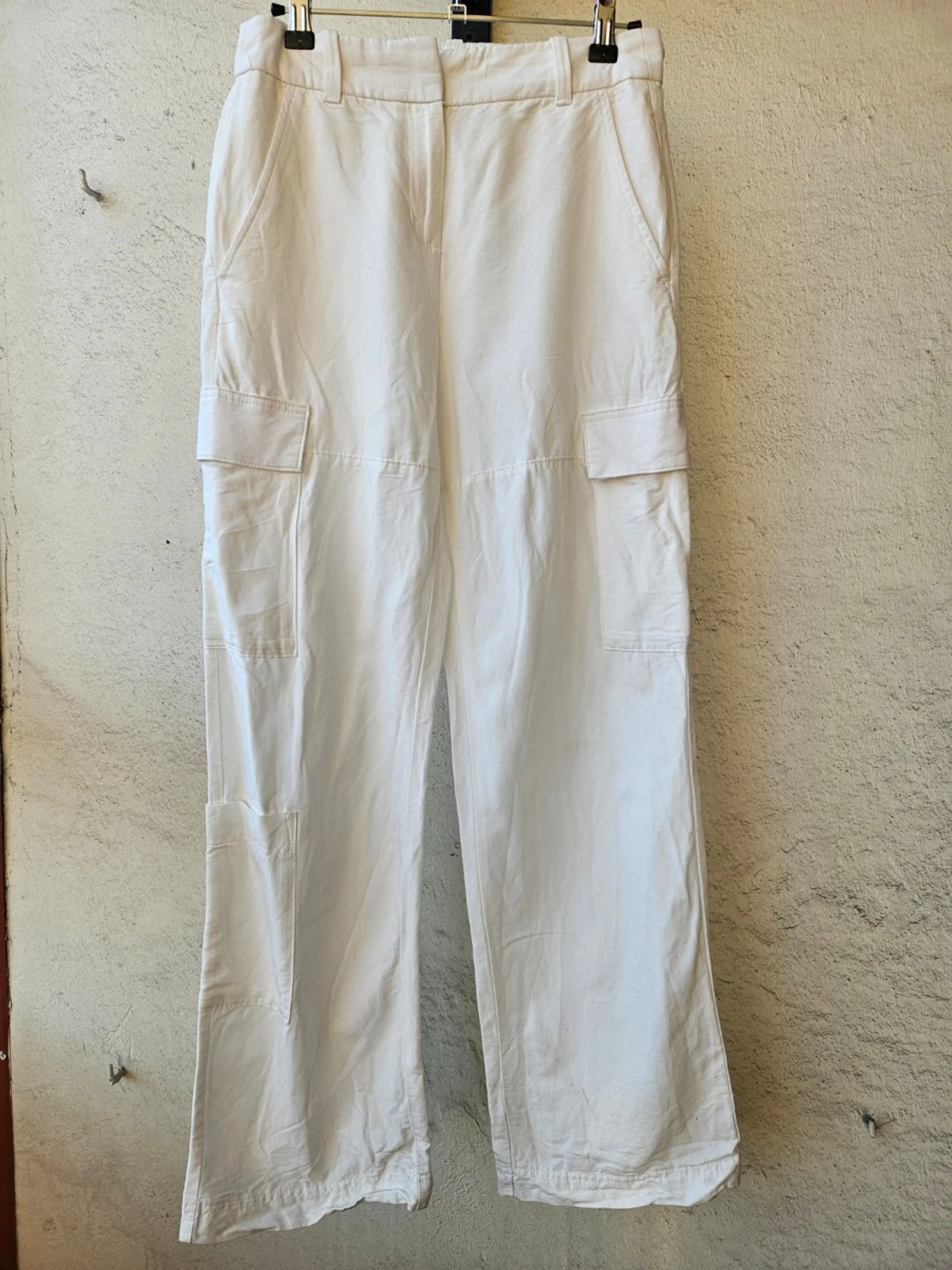 Vita linnebyxor med fickor