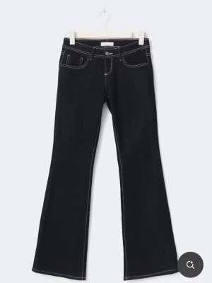 Ultra low flate jeans från Gina Tricot - Aldrig använda. Prislappen är kvar. Stl 38.