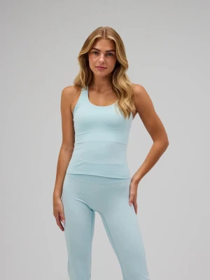 Ljusblå linnetopp - Ljusblått tränings linne som är helt oanvänt med prislappen kvar från exercere, nypris är 500kr + 100kr frakt + 100kr taxes!