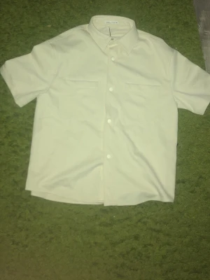 Overshirt - Öppen för byte