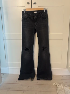 Low waist boot cut jeans Nelly - Low waist bootcut jeans belly