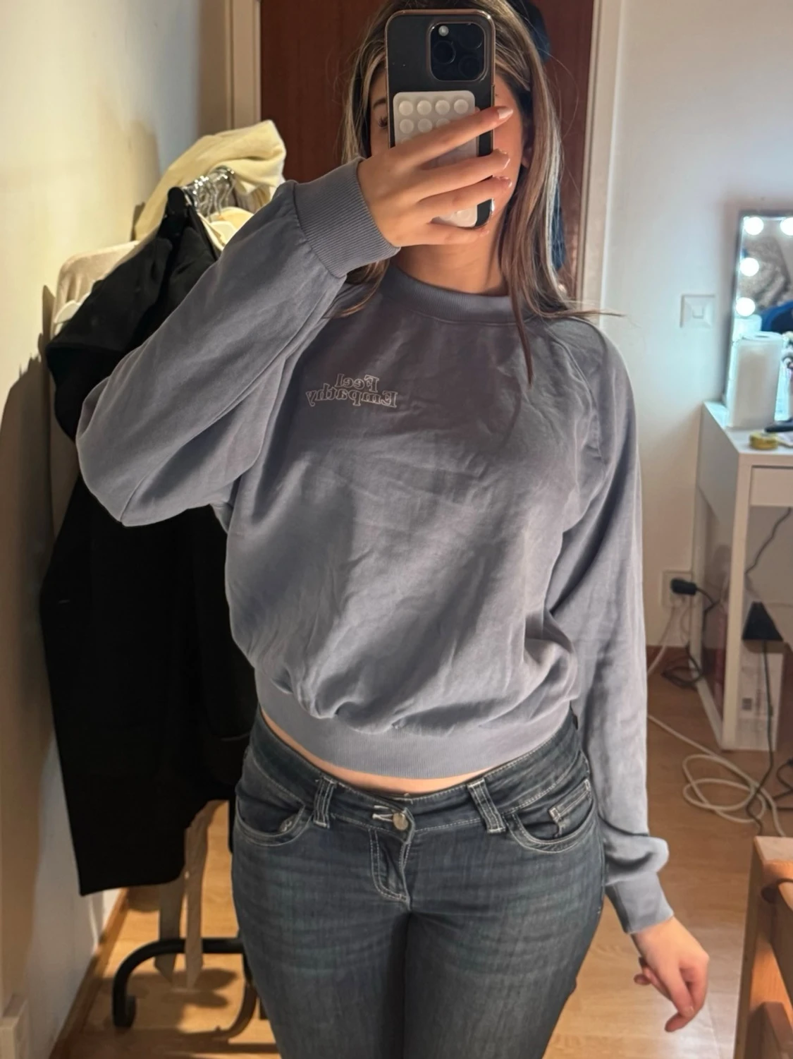 Ljusblå sweatshirt