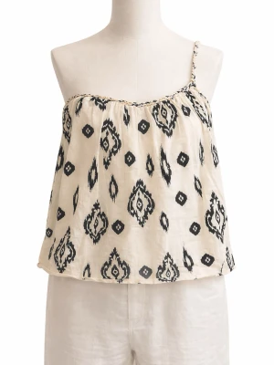 Mönstrad linnetopp med smal axelband - Snygg linnetopp i beige med svart mönster och ett smalt axelband. Toppen har en luftig passform och är perfekt för varma dagar. Materialet känns lätt och toppen har en avslappnad vibe.