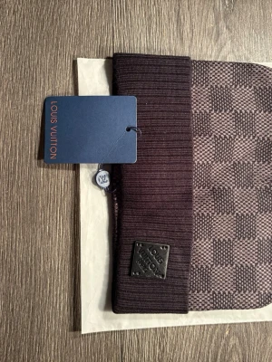 Svart rutig mössa - Svart rutig mössa ONE SIZE