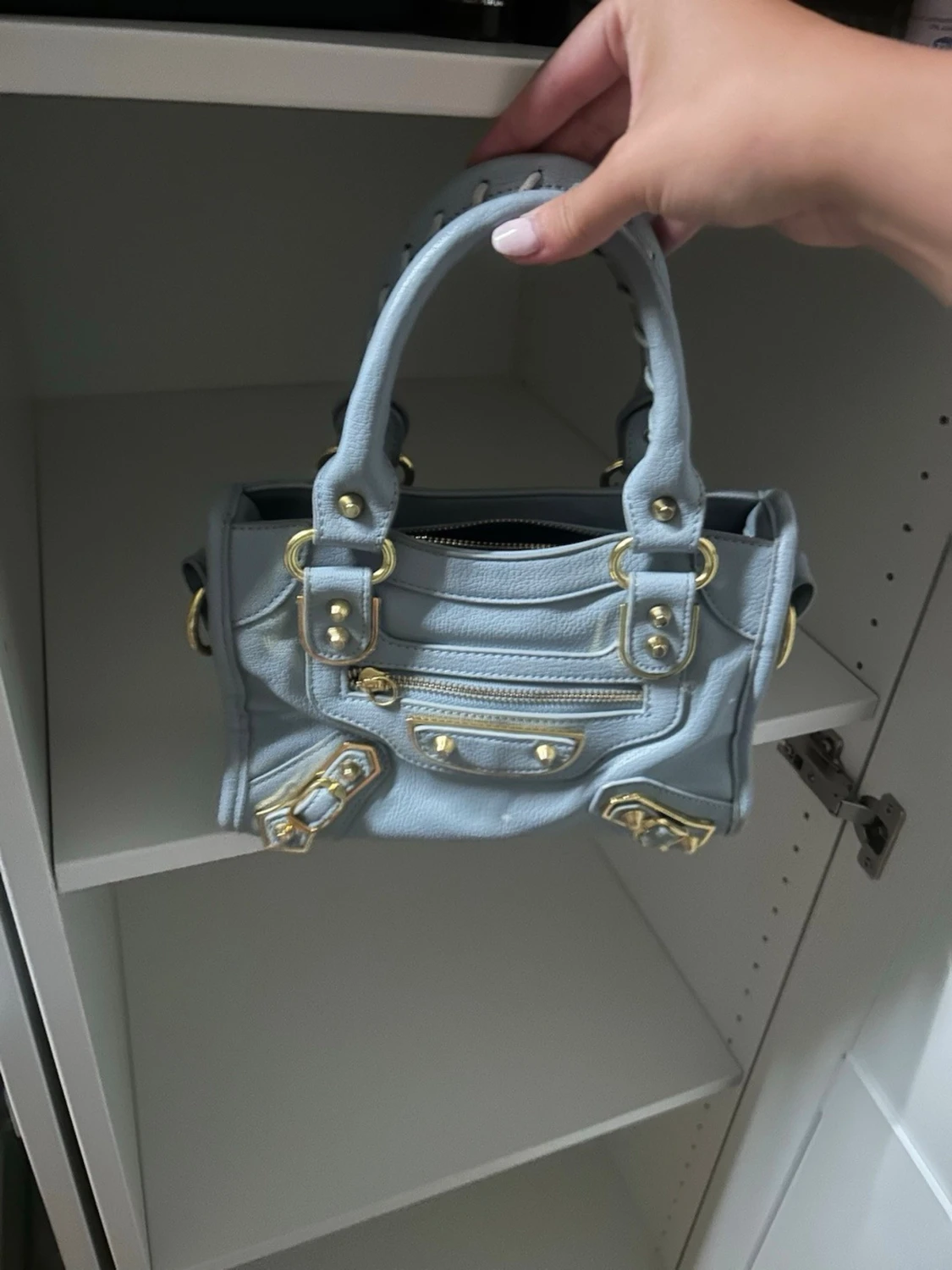 Ljusblå  handväska  - 1