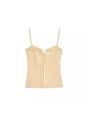 Beige korsettopp med rosett - Söt beige korsettopp med smala axelband och en liten rosett framtill. Aldrig använt 💞💞