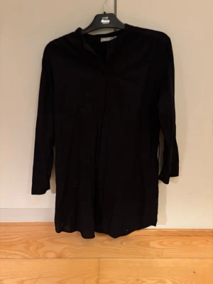 Klänning  - Svart klänning i ett mycket bra skick